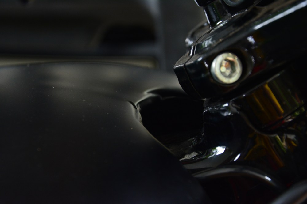 Tank Finish. The sheet metal work on the tank is absolutely pathetic. Check the dents on the curves. Again QC team???